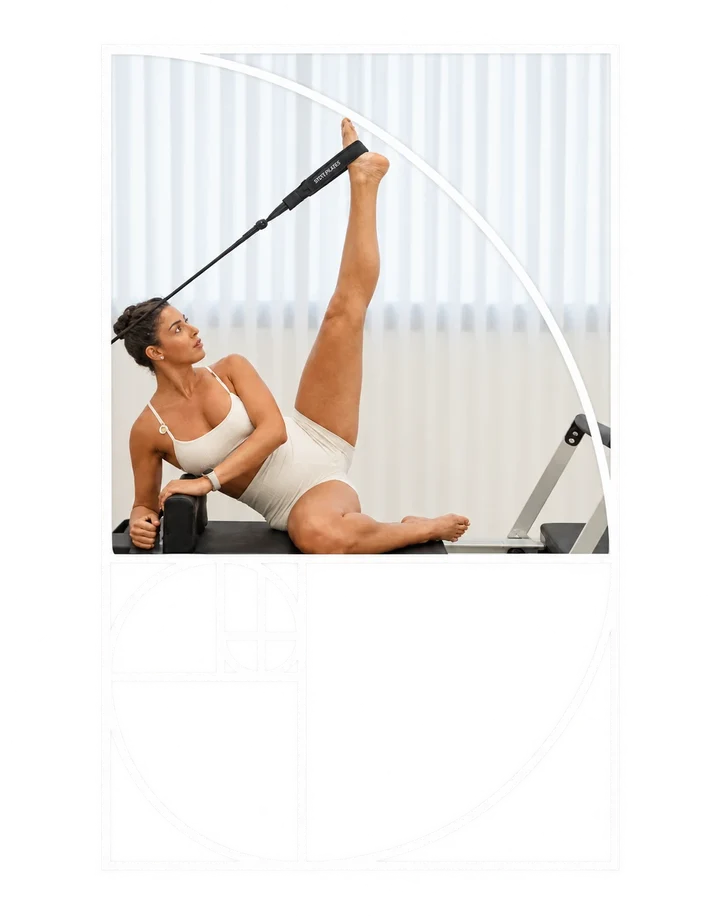 מתאמנת מתרגלת פילאטיס מכשירים בסטודיו שחר, על רקע איור של יחס הזהב